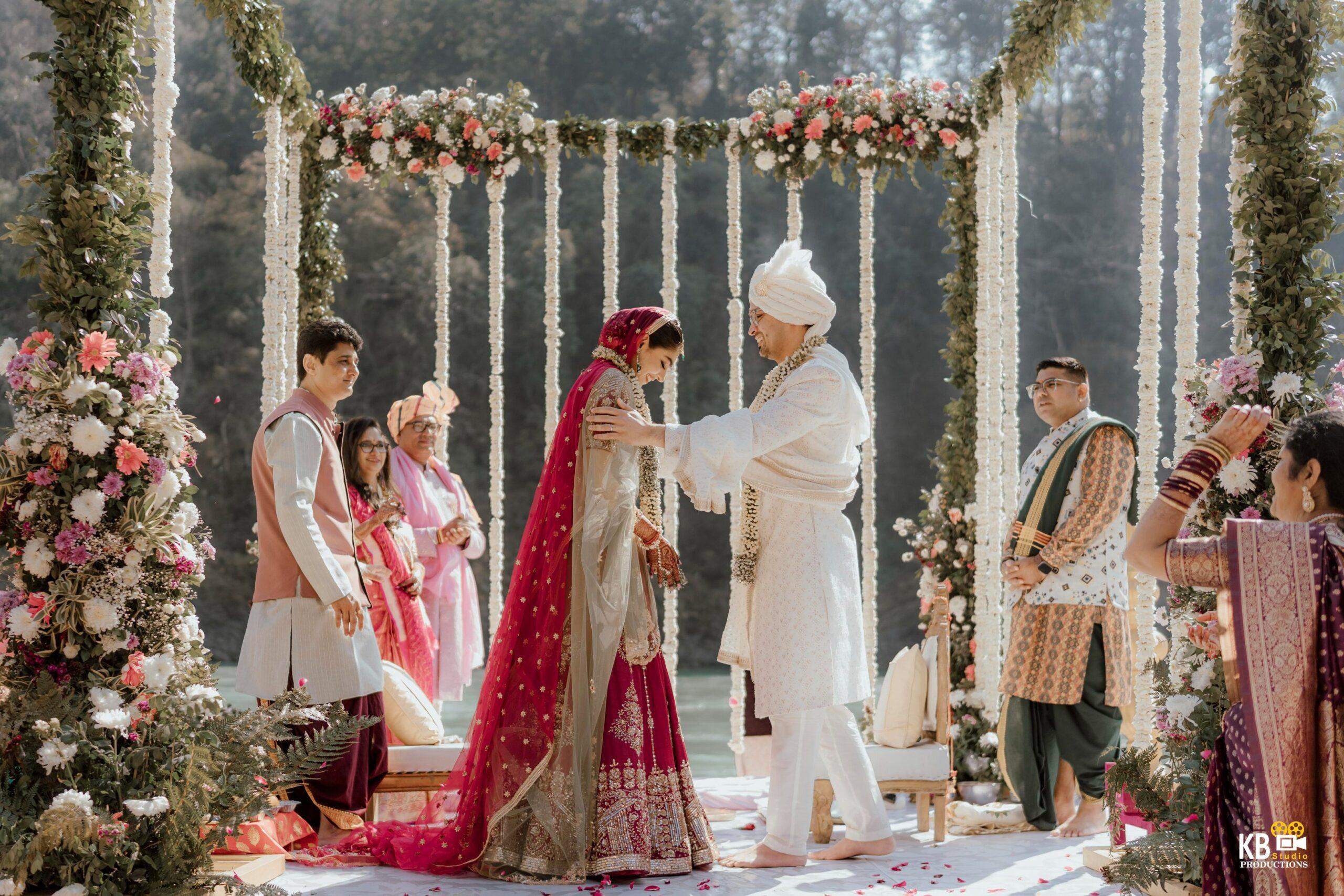 a man and woman in traditional indian wedding ceremony
